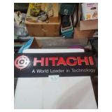 HITACHI SIGN, CARDBOARD & PLASTIC