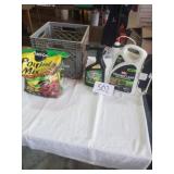 MILK CRATE, POTTING MIX 3/4 FULL, WEED