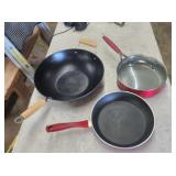 Wok and two Pioneer Woman skillets