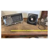 2 table fans, heater missing leg