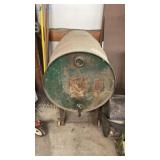 Oil barrel w used oil 1/4 full, w stand