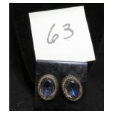 CLIP ON EARRINGS GOLD TONED HAS AN