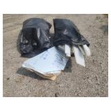 Two garbage bags of rigid foam insulation scraps