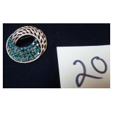 GREEN RHINESTONES SET IN A BEAUTIFUL