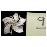 SILVERTONE PINWHEEL BROOCH 2 1/4" X 2 1/4"