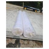 Two rolls of white cotton t-shirt like fabric