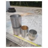 Three rolls of aluminum flashing