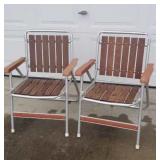 Two  folding lawn chairs