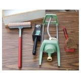 Lawn sprinkler window squeegee