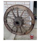 Old wood spoke wagon wheel