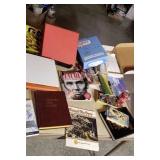 Ream of copy paper, binders, books