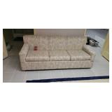 3 cushion couch/hide a bed