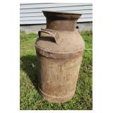 Old milk can Clarksburg IL has bullet hole in it