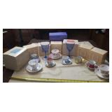 Avon cups and saucers