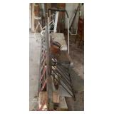 Scrap metal, wooden ladder