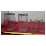 Antique Hoosier  Triple Skip Jars w lids, one