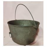 Cast-iron bean pot footed.