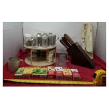 Food coloring spices, lazy Susan, knives,