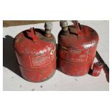 Two 5 gal gas cans