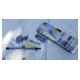 New in box paint stick.