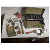 Tool  Box with wood chisels and drill bits.