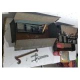 Two tool boxs with tools.