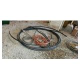 Plastic 1" pipe and hose.