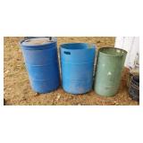 Two plastic barrels