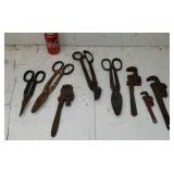 Tin snips  and pipe wrenches