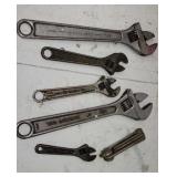 Adjustable wrenches