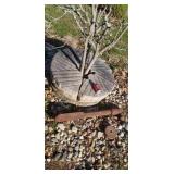 Large grist mill stone with shaft