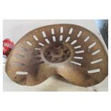 Old steel tractor seat