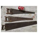 3 old saws, one is a Ice saw