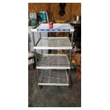 Store metal display shelving units on rollers