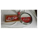 Two  Coca-Cola clocks