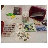 Tote full of bead making supplies & books.