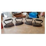 4 old sad irons