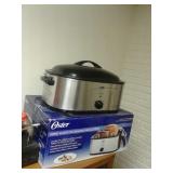 LIKE NEW OSTER 22QT. ROASTER OVEN