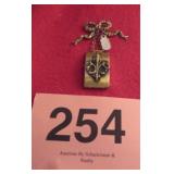ART DECO BRASS COIN HOLDER BROOCH