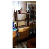 5 1/2  shelving unit with two door bottom.