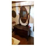 Oak dresser with serpentine front mirror.