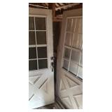 Two used 36" storm doors