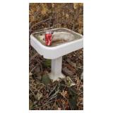 Old cast iron pedestal sink