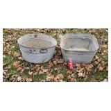 Two galvanized bath tubs.