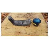 Seventies motorcycle seat and helmet.