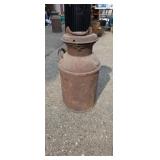 Old milk can one handle is broken off