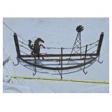 All metal cowboy pot holder