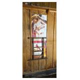 Pool cue rack and Cardinals poster