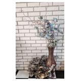 Decorative metal vase, glass decor and ivy