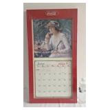 Coca-Cola calendar holder, copyright 1999, with